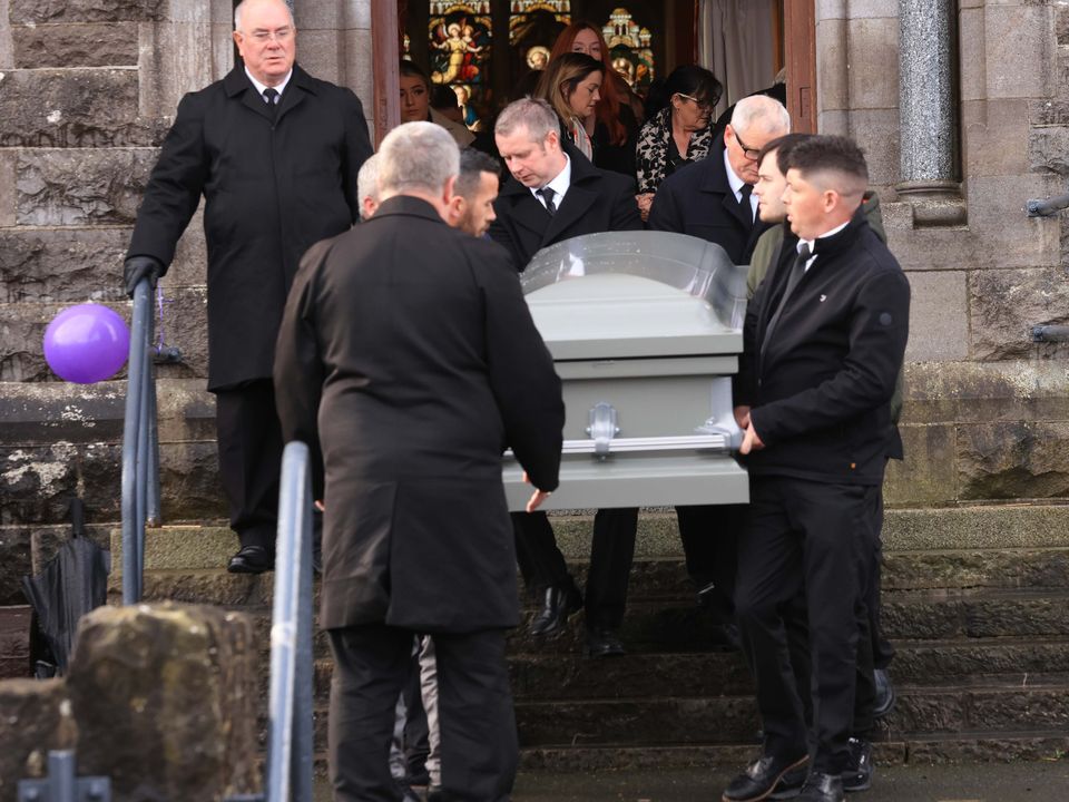 Denise’s coffin is taken from the church
